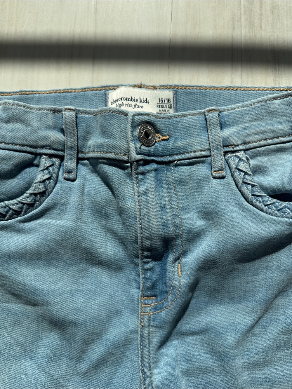 abercrombie kids light blue bootcut jeans with braided pocket detail